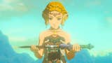 Princess Zelda holds a broken Master Sword against a blue sky in Tears of the Kingdom